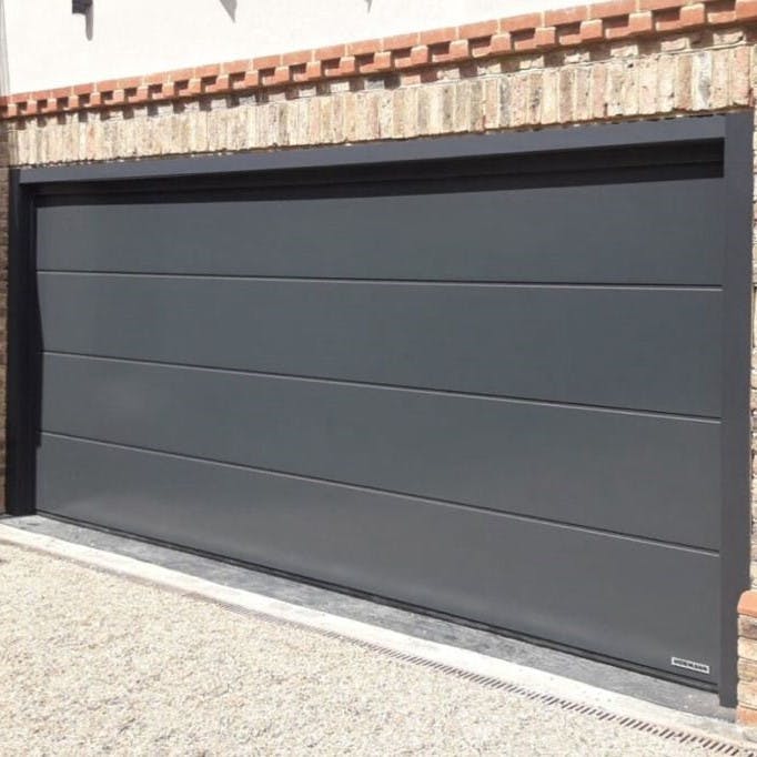 Image: Installation of an L ribbed smooth sectional door in Bedford